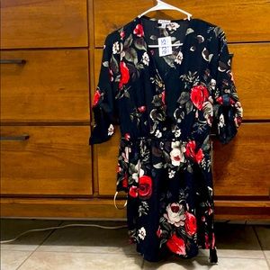 Black jumper with flowers and belt